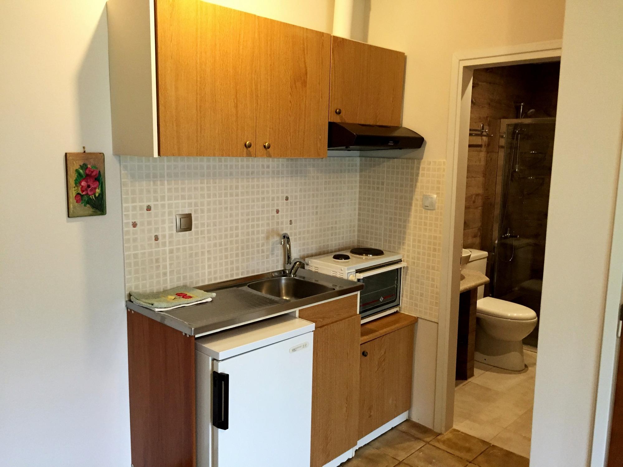 Kitchenette at self catering 4-person apartments with balcony